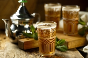 Moroccan mint tea in glasses with silver pot