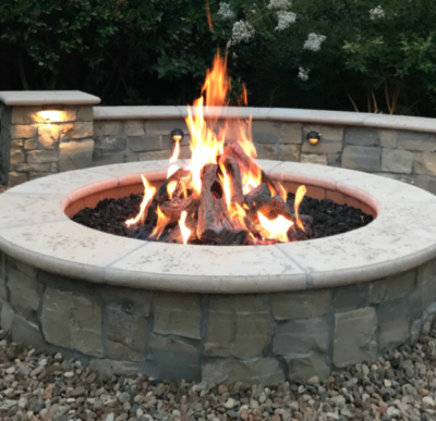 Small fire pit in gravel garden