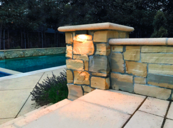 Stone seatwall with inset path lighting