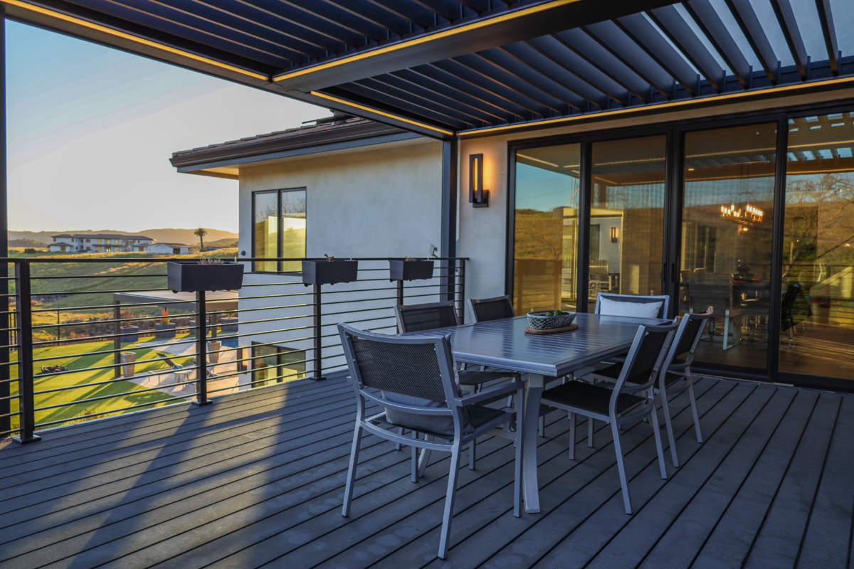 Contemporary farmhouse patio with elegant ambient lighting