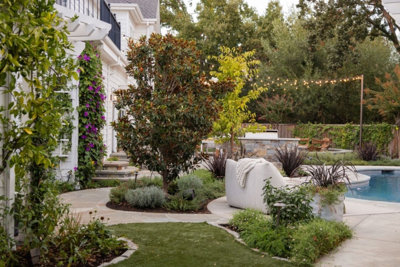 Colorful entry planting with warm wood and Corten steel