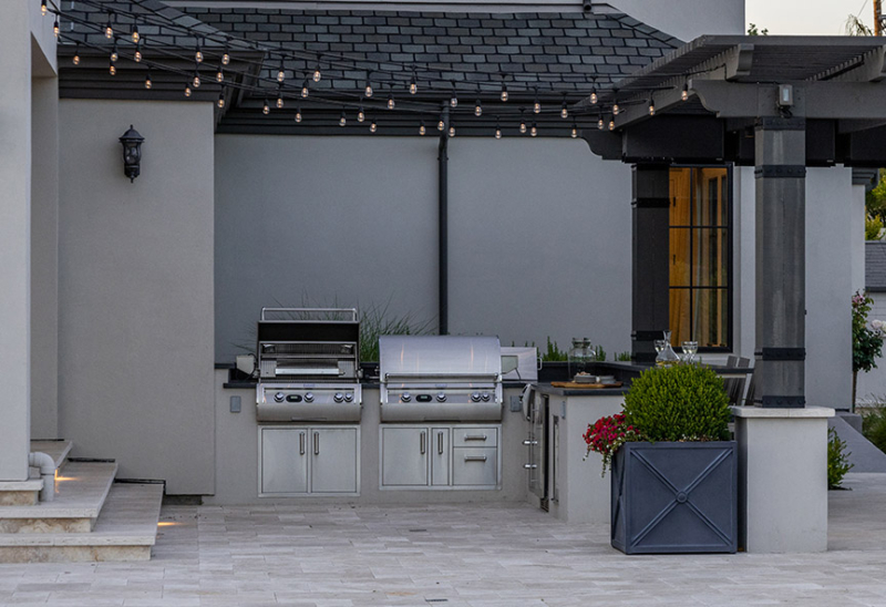 Outdoor kitchen under custom pavilion roof